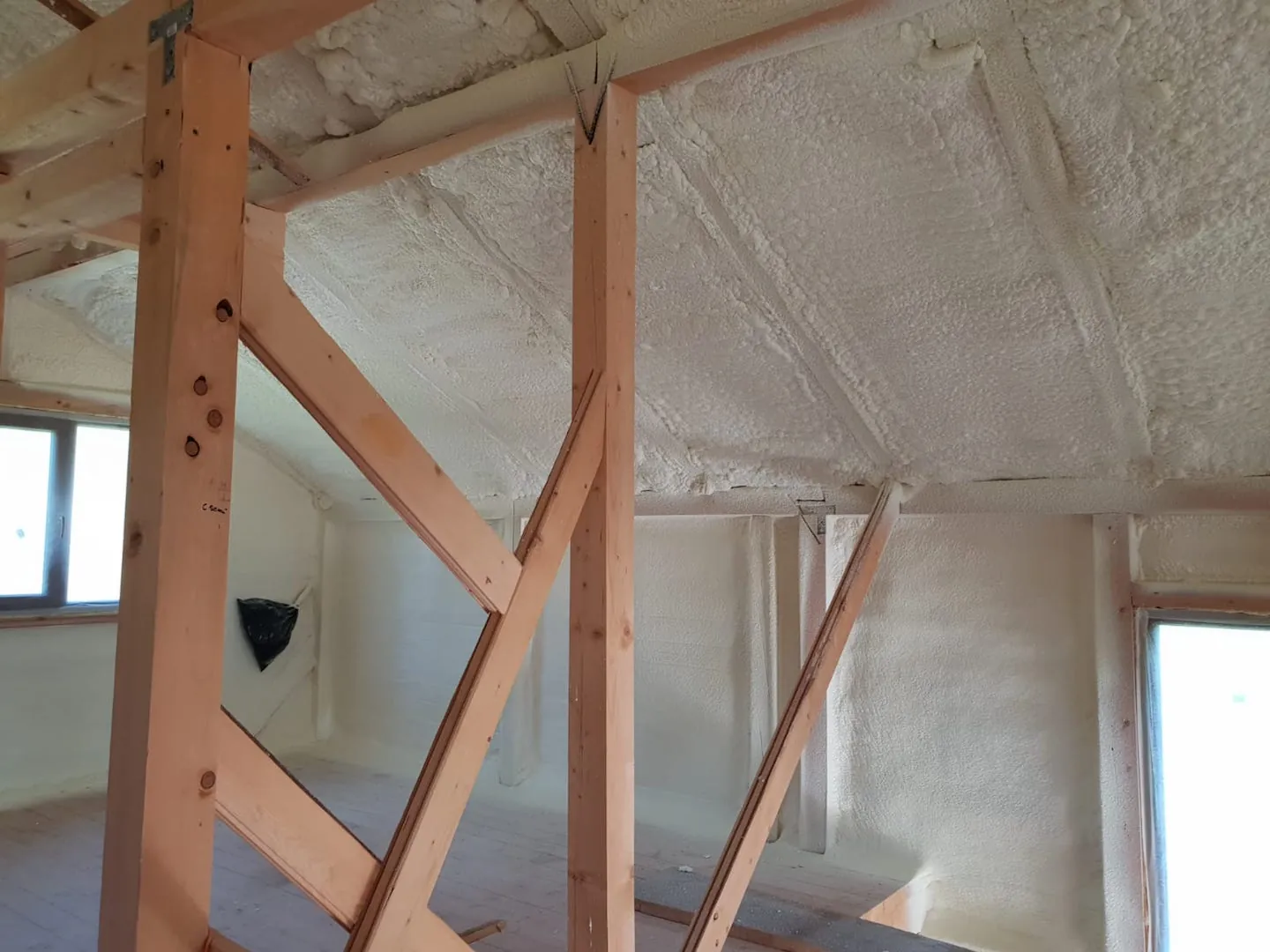 Closed-cell spray foam insulation applied in a home